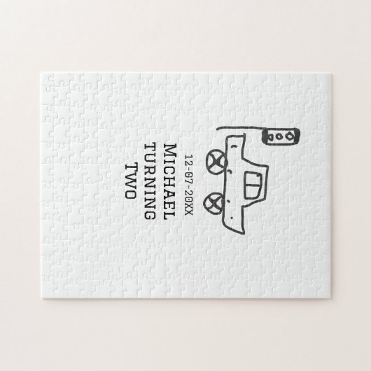 マイケルが二つの誕生日おもちゃ車の信号機を回す ジグソーパズル (横)