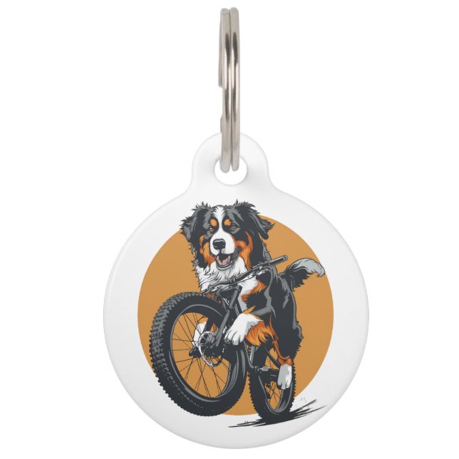 マウンテンバイクに乗るベルネーズマウンテンドッグ ペット　ネームタグ (正面)