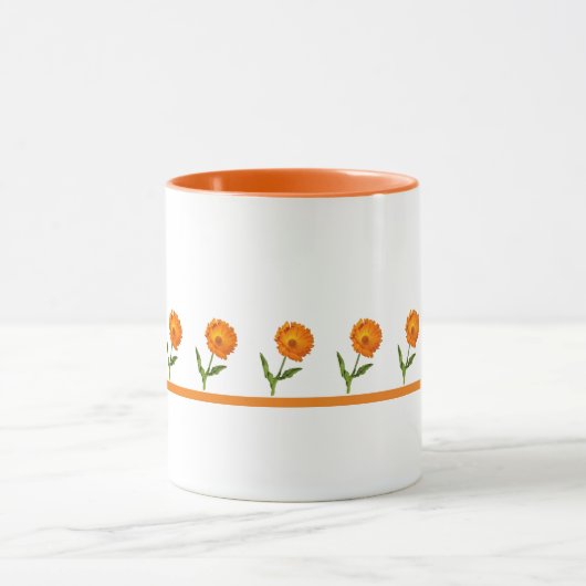 マグカップ – オレンジ色の花を線で描く (中央)