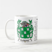 マググティエレス家族の紋章付き外衣 コーヒーマグカップ (左)