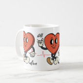 マグ、まだ生きている コーヒーマグカップ (正面左)