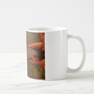 マスを手に コーヒーマグカップ