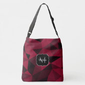 マゼンタピンクの赤い黒い幾何学パターンモノグラム クロスボディバッグ (裏面)