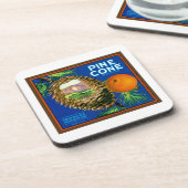 マツ円錐形のオレンジ コースター (左側)