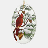 マツ円錐形のクリスマスのオーナメントを持つ赤い(鳥)ショウジョウコウカンチョウ セラミックオーナメント (左)