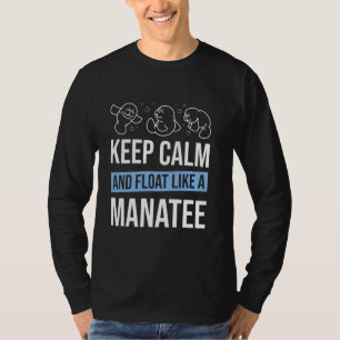 マナのよう保に、穏やかに浮くマナティー海の動物 Tシャツ