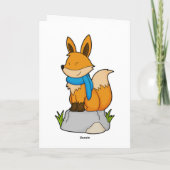 マフラーにスカーフをした岩の上のキツネ カード (裏面)