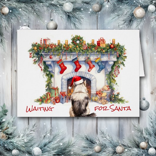 マラムテドッグがサンタクリスマス暖炉を待つ