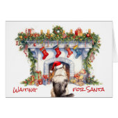 マラムテドッグがサンタクリスマス暖炉を待つ (正面横)