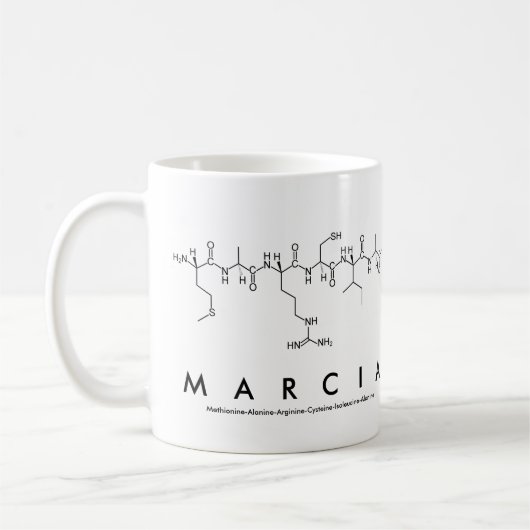 マルシアペプチド名mug コーヒーマグカップ (左)