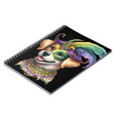 マルディグラの服を着た可愛らしい毛羽立ち犬 ノートブック (左側)