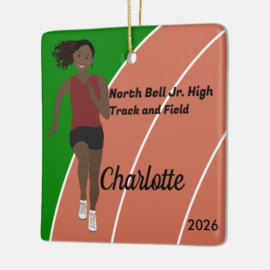 マルーンブラックの黒いヘアトラックとフィールドガール セラミックオーナメント (左)