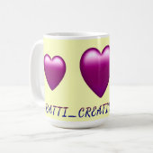 マロン色のハート型「Ratti_Creative_Arts」デザイン コーヒーマグカップ (正面左)
