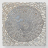 マンホールの蓋および玉石の道の石のコースター ストーンコースター (正面)