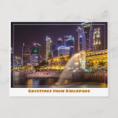 マーライオンをフィーチャーした夜のシンガポールのスカイライン ポストカード (正面)