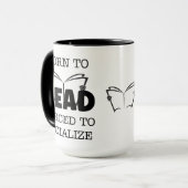 マ生まれグの交付を強いられる マグカップ (正面左)