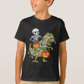ミイラに乗るスケルトンのティラノサウルス・ハロウィン Tシャツ (正面)