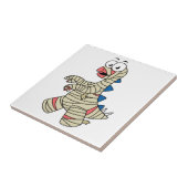 ミイラの格好をした漫画のステゴサウルス。 タイル (側面)