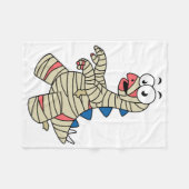 ミイラの格好をした漫画のステゴサウルス。 フリースブランケット (正面(横))