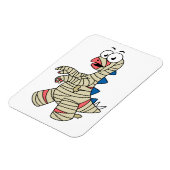 ミイラの格好をした漫画のステゴサウルス。 マグネット (左側)