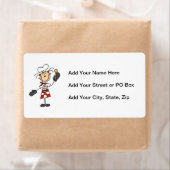 ミッツと木製スプーンを使った女性シェフ ラベル (インサイチュ)