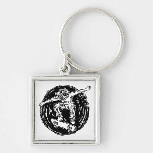 ミッドエアスケートボードをしている伝説的なスケーター キーホルダー (正面)