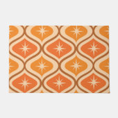 ミッドセンチュリーアトミックスターバストオンオレンジオギー ドアマット (正面)