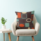 ミッドセンチュリーモダンティール（緑がかった色）とオレンジ クッション (椅子)