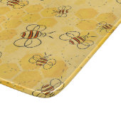 ミツバチが蜂蜜をブンブン飛ばす可愛い カッティングボード (角)