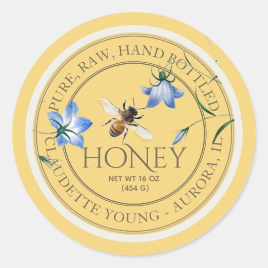ミツバチと青い花黄色のハニーラベル ラウンドシール (正面)
