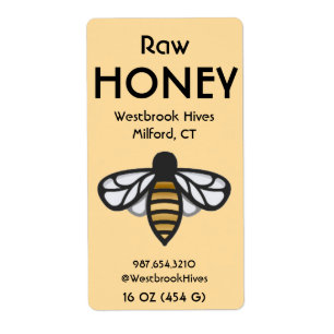ミツバチの黄色いラベルに書かれた非加熱はちみつ HONEY ラベル