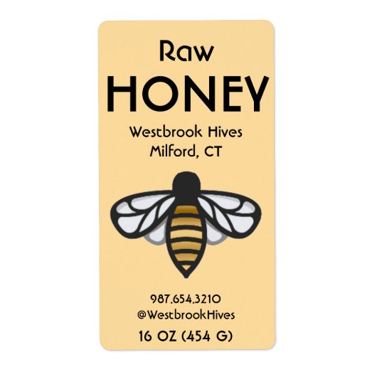 ミツバチの黄色いラベルに書かれた非加熱はちみつ HONEY ラベル (正面)