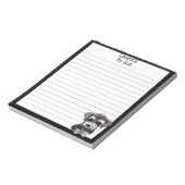 ミニチュアシュナウツァー子犬のリストに並んだペット犬 ノートパッド (回転)