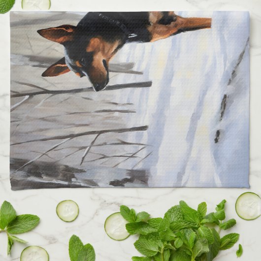 ミニチュアピンシャーで雪のクリスマスを過ごす キッチンタオル (折り畳み)