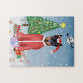 ミニチュア・ピンシュの雪にクリスマスのプレゼントを贈る犬 ジグソーパズル (横)