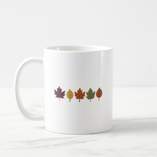 ミニマリストの秋の葉の陶磁器コーヒーマグ コーヒーマグカップ (左)