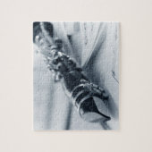 ミュージックシート上のクラリネット ジグソーパズル (縦)