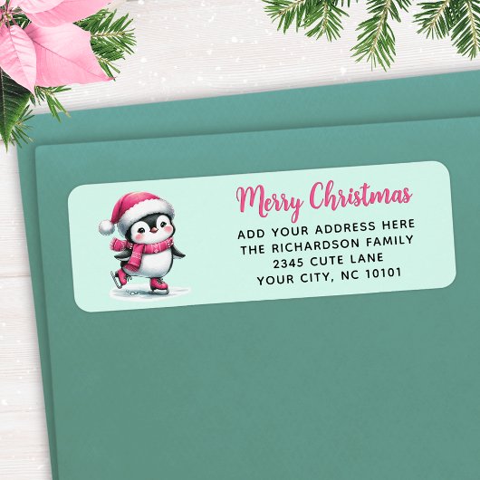 ミントとピンクの氷のスケートで滑るペンギンメリークリスマス ラベル