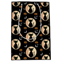 ムーン不気味ハロウィーンの黒猫の緑の目