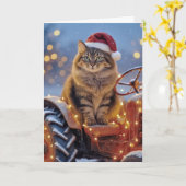メインクーンのクリスマス猫が古いトラクターに乗って カード (黄色い花)