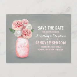 メイ色彩の鮮やかンの瓶とピンクの花は日付を保存する 案内ポストカード