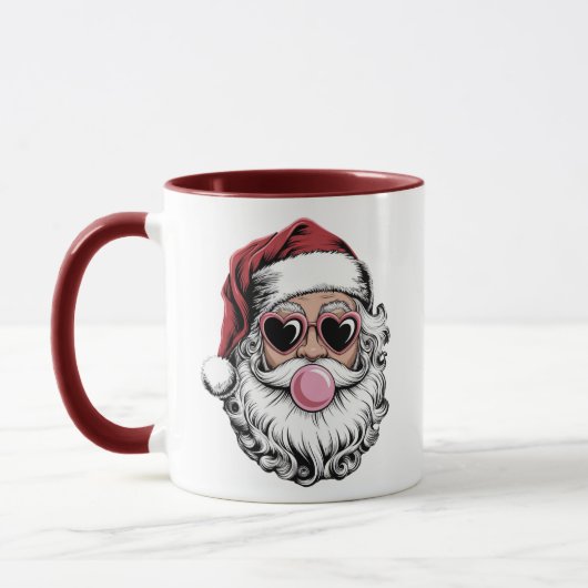 メガネのレトロサンタがシャボン玉を飛ばす クリスマス マグカップ (左)