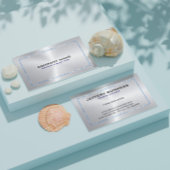 メタリックシルバーグレーの背景とブルー縁ど 名刺