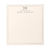 メモ帳の机からピンクの弓 ノートパッド (正面)