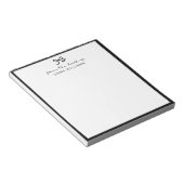 メモ帳の机から黒い弓 ノートパッド (アングル)