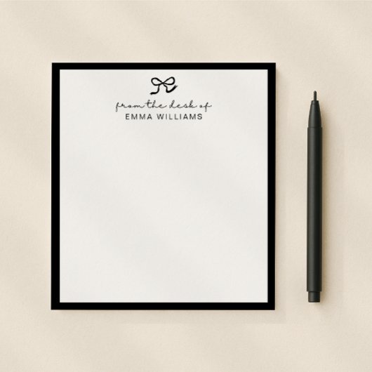 メモ帳の机から黒い弓 ノートパッド