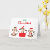 メリークリスマスかわいいサルクリスマス帽子 カード (黄色い花)