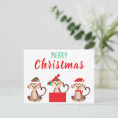 メリークリスマスかわいいサルクリスマス帽子 ポストカード (スタンド正面)