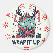 メリークリスマスかわいいモンスターギフト包まれた マグネット (正面)