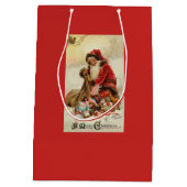 メリークリスマスのヴィンテージサンタ ミディアムペーパーバッグ (裏面)